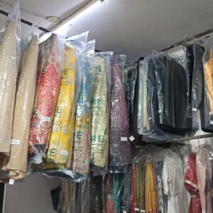 Uniqare uses eco-smart and fabric-safe solvents to clean without compromise. Close-up of dry cleaning solvents and equipment used at Uniqare Dry Clean in Gurgaon